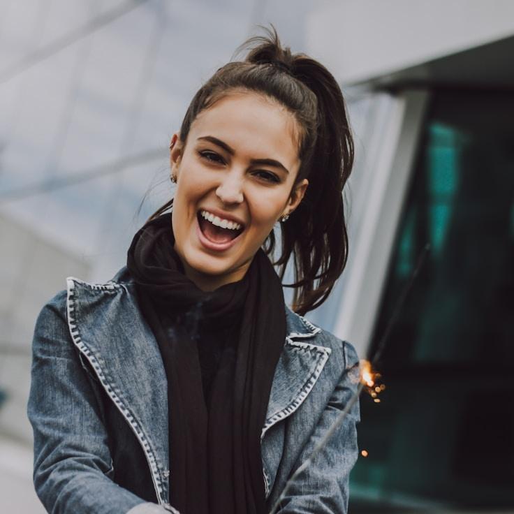 Alex Morgan, Lead Design Curator at Pine Atlas Shore, reviewing corporate floral arrangements